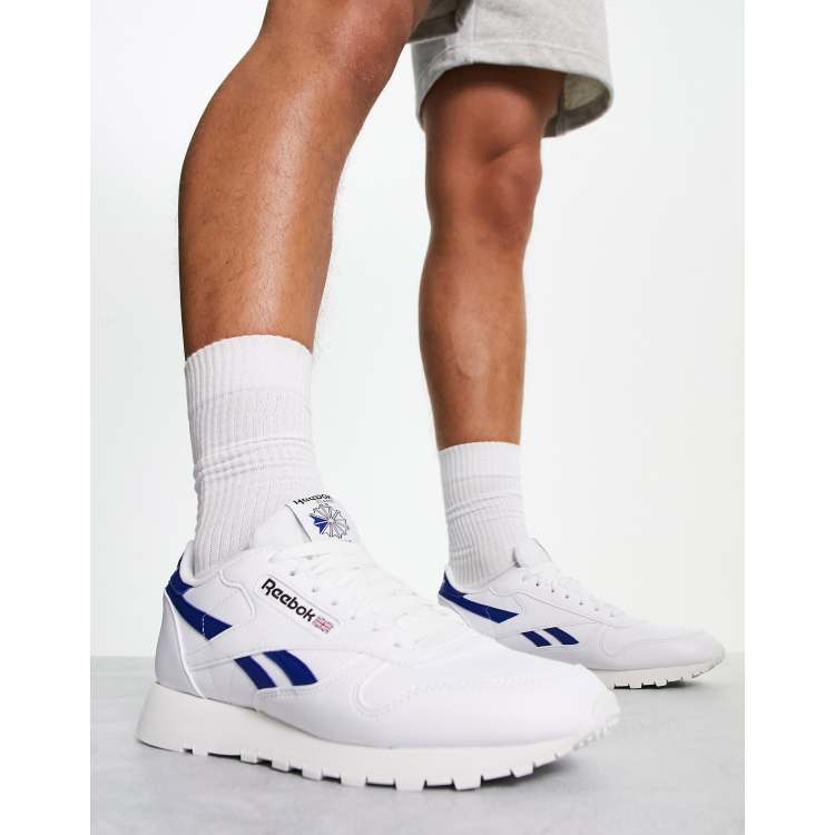 Zapatillas de cuero en blanco y azul de Reebok ASOS