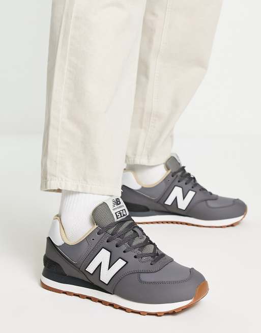 Subir y bajar calculadora diapositiva Zapatillas de ante en gris oscuro 574 de New Balance | ASOS