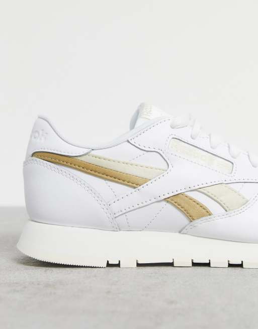 Zapatillas reebok blancas store con dorado