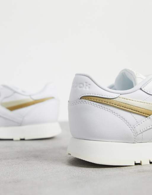 Zapatillas de cuero en blanco con detalle dorado Classic de Reebok