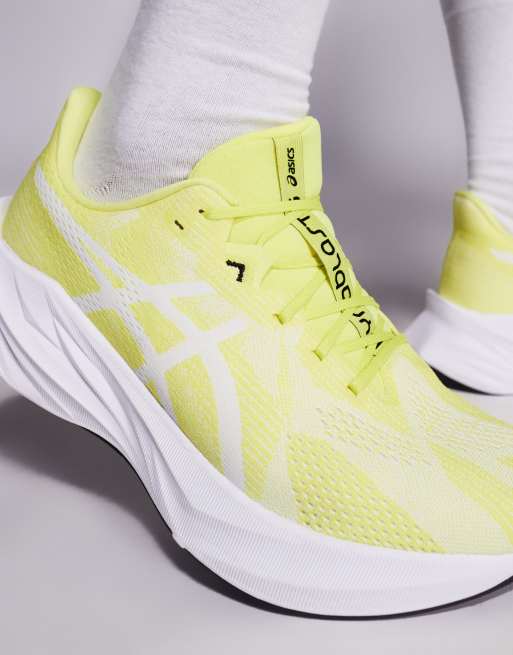 Zapatillas de deporte amarillo cítrico y blancas para correr
