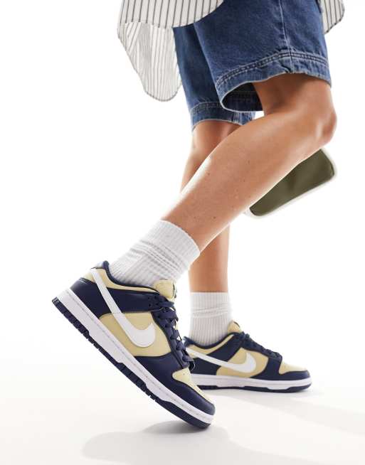 Zapatillas de deporte azul marino medianoche y doradas Dunk Low NN de Nike