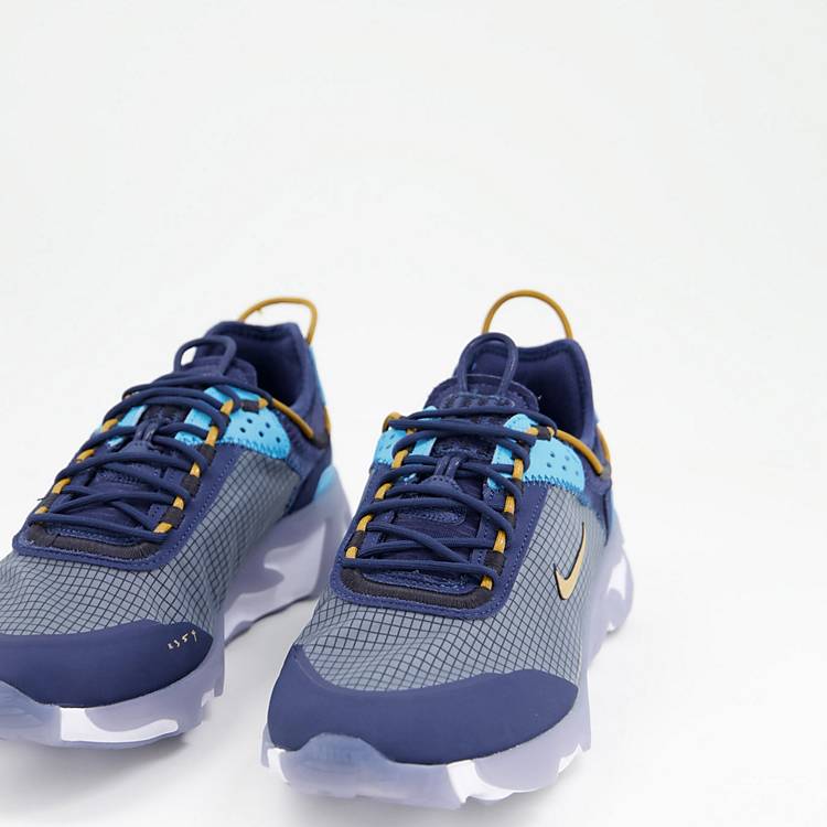 giratorio En todo el mundo derrochador Zapatillas de deporte azules y amarillas React Live de Nike | ASOS