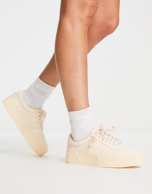 Zapatillas de deporte beis uniforme con cordones y plataforma