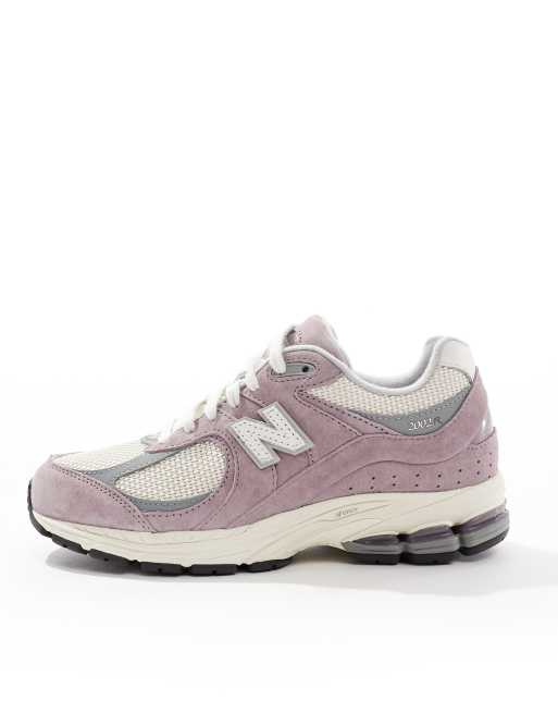 Zapatillas de deporte beis y moradas unisex 2002R de New Balance, 2 de 5