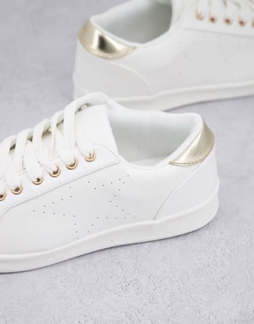 Zapatillas de deporte blancas con detalle de estrella de