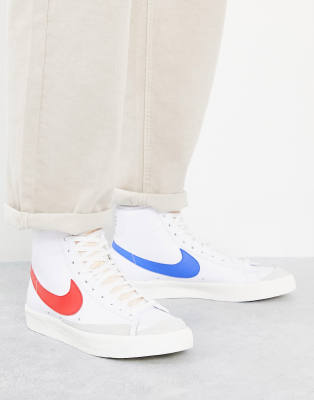 nike blancas logo azul