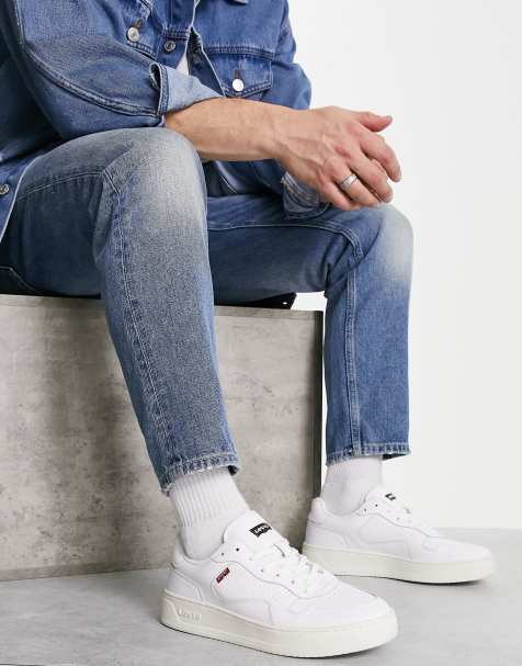 Zapatillas de deporte blancas con suela gruesa y etiqueta roja del logo de cuero Glide de Levi's - view 1