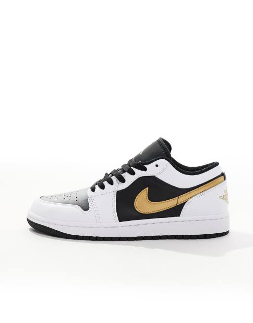Zapatillas de deporte blancas, negras y doradas Air Jordan 1 Low de Jordan, 2 de 5