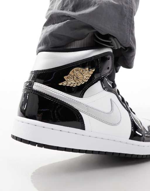 Zapatillas de deporte blancas, negras y plateadas Air Jordan 1 Mid de Nike, 3 de 5