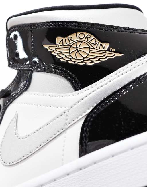 Zapatillas de deporte blancas, negras y plateadas Air Jordan 1 Mid de Nike, 5 de 5