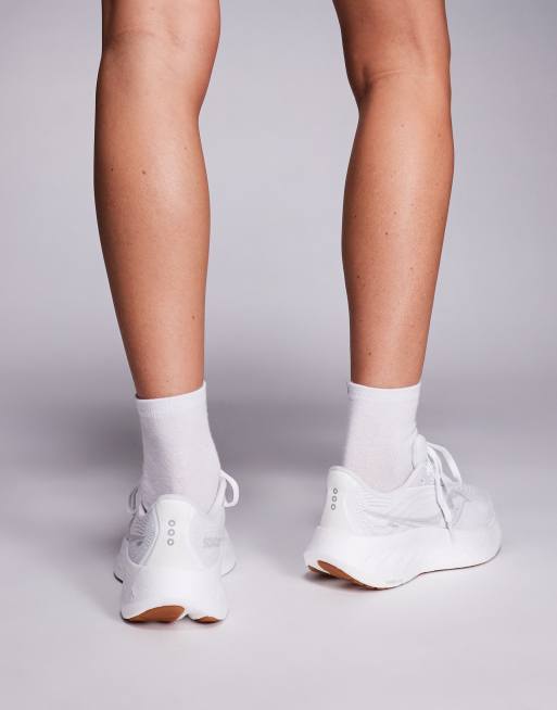Zapatillas de deporte blancas para correr con detalles de goma Ride 18 de Saucony, 3 de 5