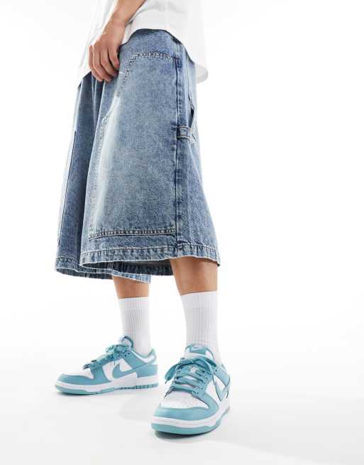 Zapatillas de deporte blancas y azules Dunk Low Retro de Nike, 5 de 5