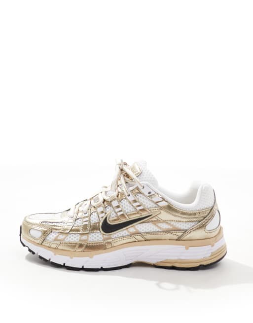 Zapatillas de deporte blancas y doradas P-6000 de Nike ASOS