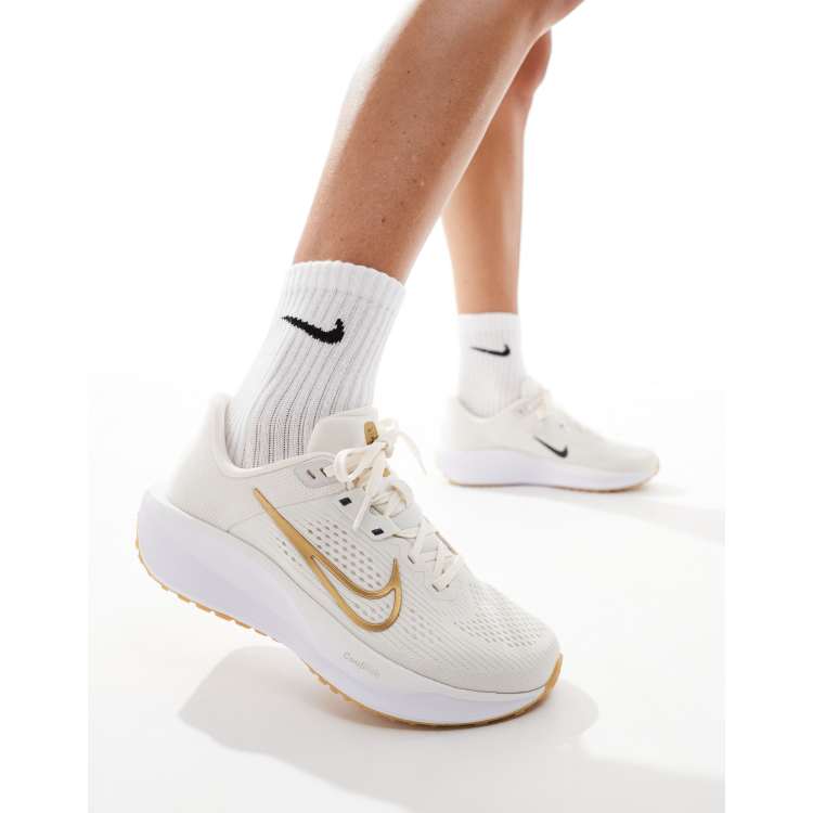 Mallas nike dorados online