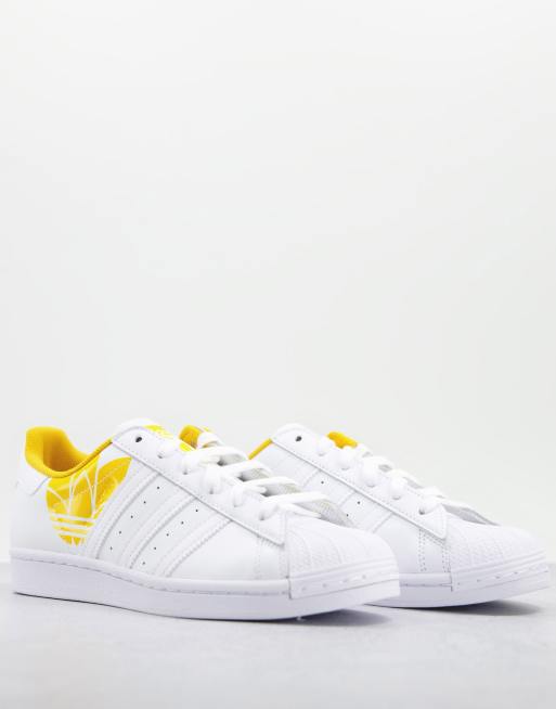 Zapatillas de deporte blancas y doradas Superstar de adidas Originals |