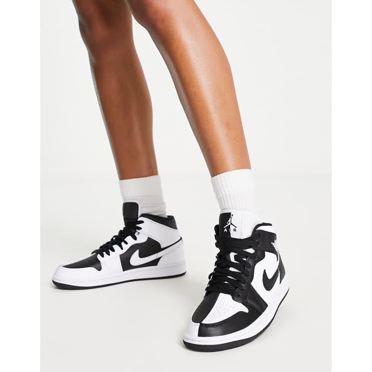 Zapatillas de deporte blancas y negras Air Jordan 1 Mid de Jordan