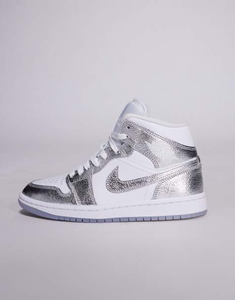 Zapatillas de deporte blancas y plateado metalizado Air Jordan 1 Mid de Nike - view 1