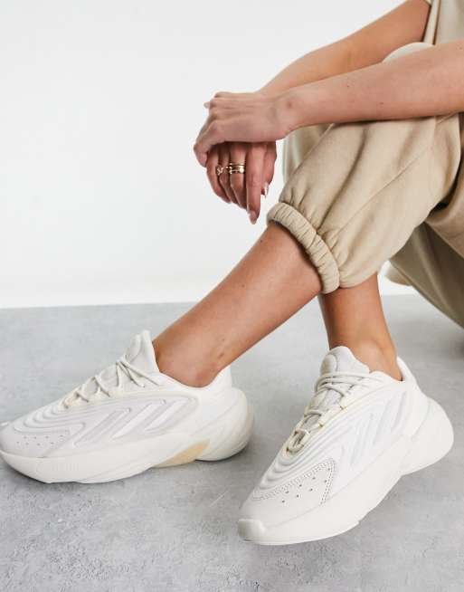 Zapatillas de deporte blanco hueso con detalles color melocot n