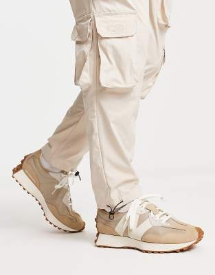 Zapatillas de deporte color arena 327 premium de New Balance