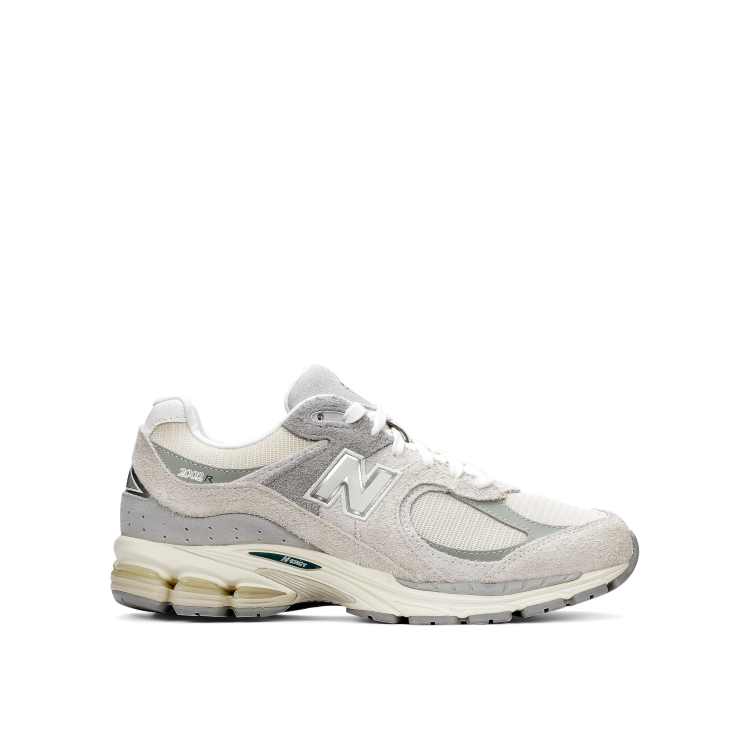 New balance hotsell gris y doradas