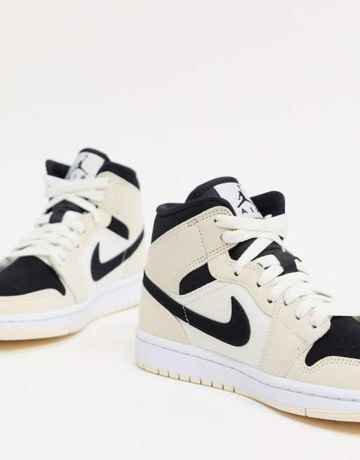 Zapatillas de deporte color crema y negro de media ca a Air 1 Mid de Jordan