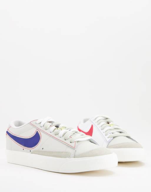 Zapatillas de deporte color crema y rojo con capa inferior dorada y logos desmontables Blazer Low X de Nike