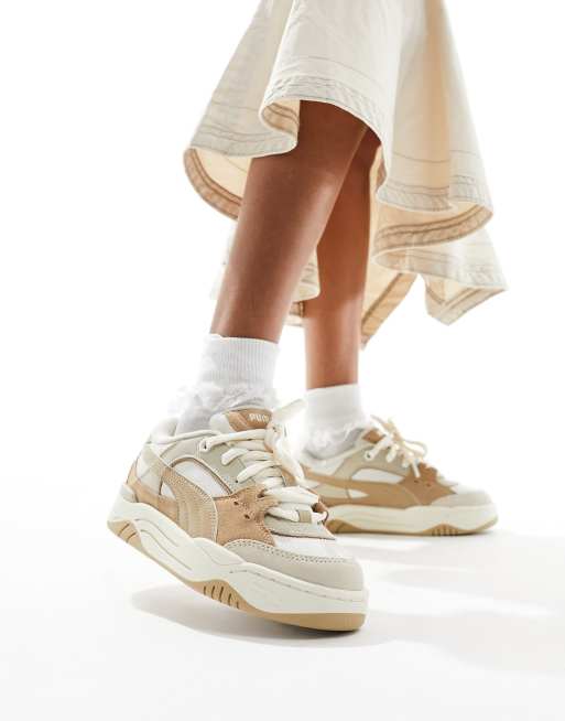 Zapatillas de deporte color tostado y blancas 180 de PUMA