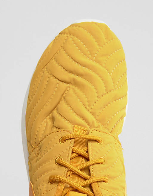 Zapatillas de deporte con de hoja dorada Roshe Premium de Nike | ASOS