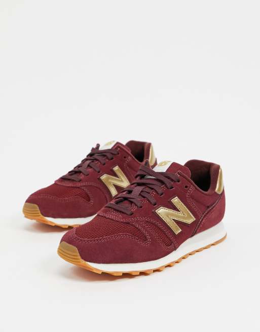 New balance discount bordo y dorado