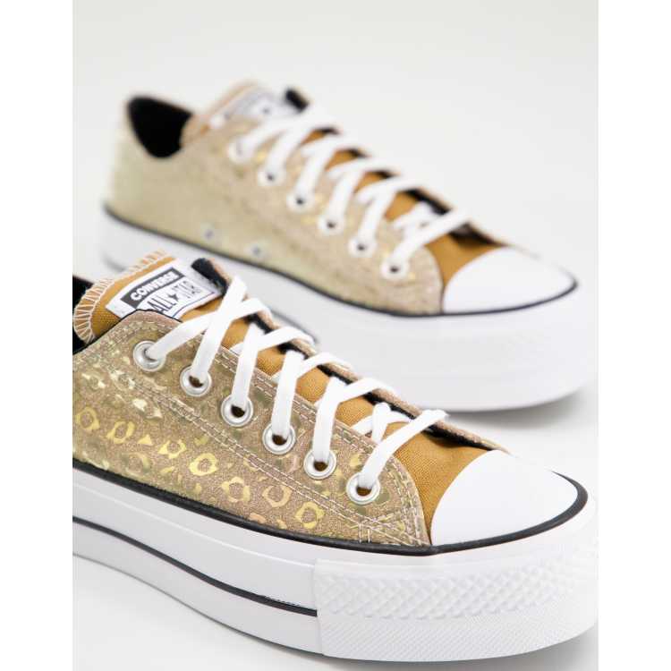 Zapatillas de deporte doradas con estampado de leopardo metalizado