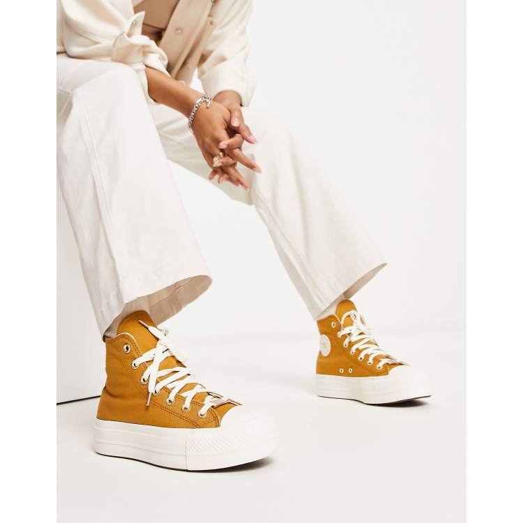 Susceptibles a después del colegio posibilidad Zapatillas de deporte doradas hi-top con plataforma Chuck Taylor All Star  Lift Hi de Converse | ASOS