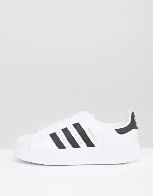 Zapatillas de deporte en blanco y negro con doble suela llamativa Superstar  de adidas Originals | ASOS