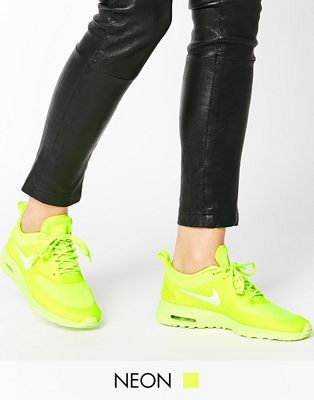 Zapatillas de deporte en color flúor Air Max Thea Volt de Nike | ASOS