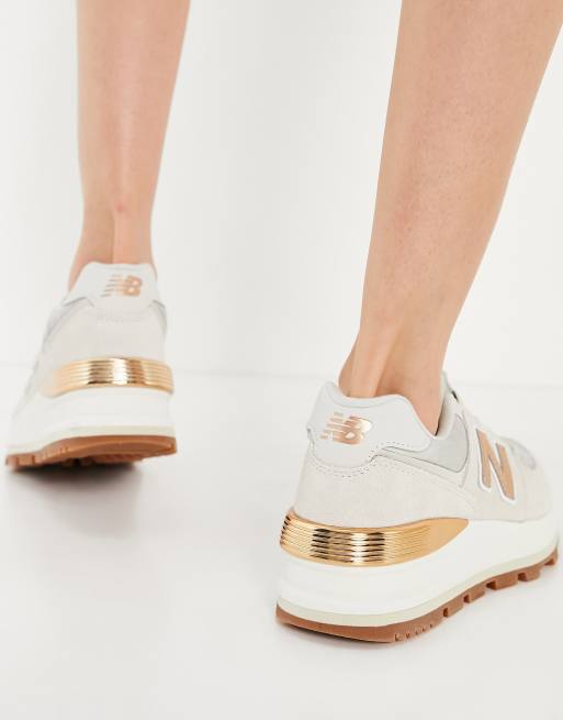 Zapatillas de deporte en colores beis dorado con cu a 574 de New Balance