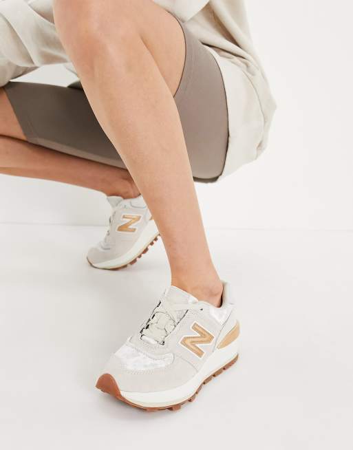 New balance beige con dorado store