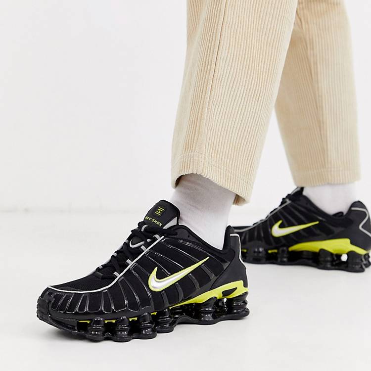 Finanzas Cobertizo azafata Zapatillas de deporte en negro y amarillo Shox TL de Nike | ASOS
