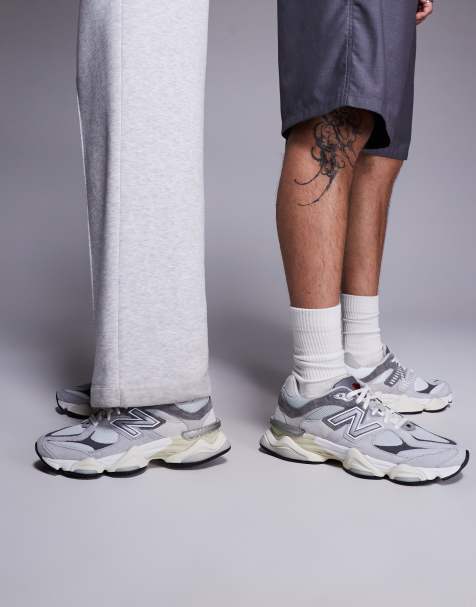 New balance gris hombre dorado top