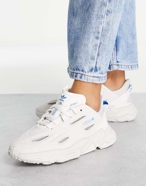 Zapatillas de deporte grises con detalles azules Ozweego Celox de adidas Originals ASOS