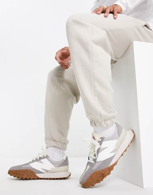 Zapatillas de deporte grises y blancas de New Balance | ASOS