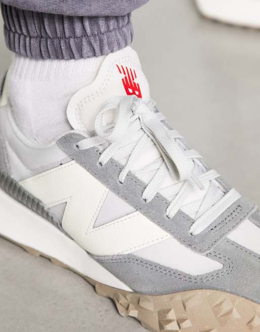 Zapatillas de deporte grises y blanco hueso XC72 de New Balance