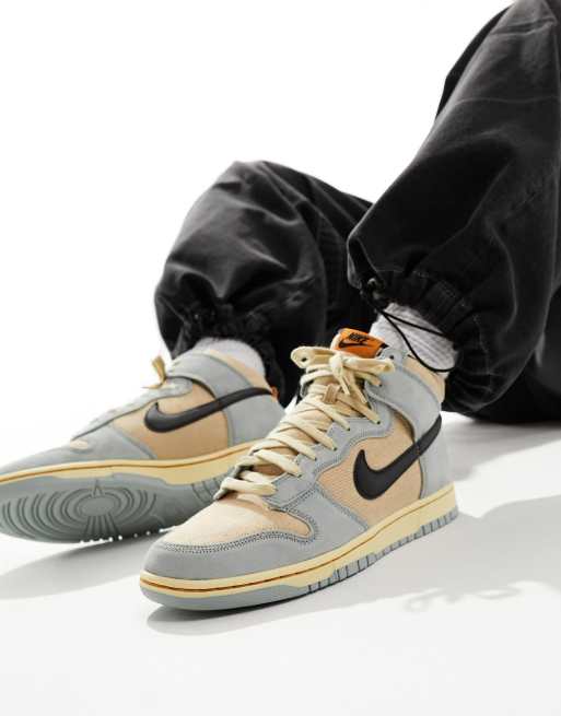 Nike Dunk Hi Retro SE trainers in grey and brown