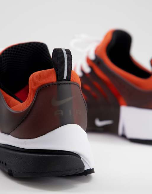 Zapatillas de deporte naranjas y negras Air Presto de Nike ASOS