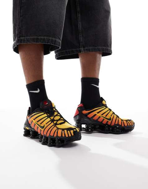 Zapatillas de deporte naranjas y negras Shox TL de Nike - view 1