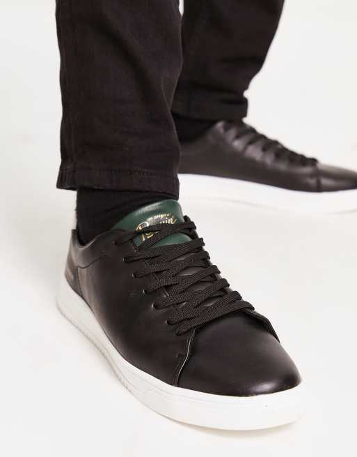 Zapatillas de deporte negras con minimalista de cuero liso de Original Penguin | ASOS