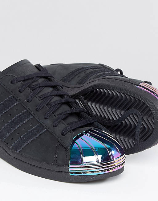 Mujer joven pintar sabor dulce Zapatillas de deporte negras con puntera metalizada holográfica Superstar  de adidas Originals | ASOS