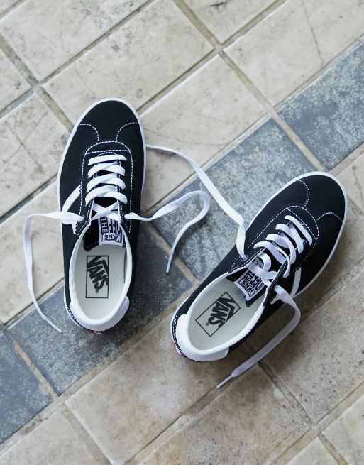 Vans negras shop suela blanca