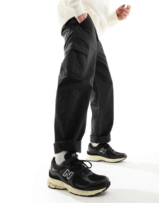New balance negras de cuero sales