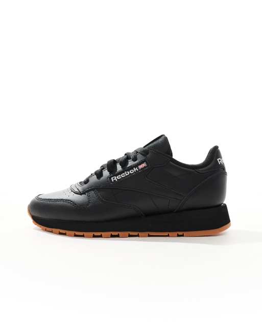 Zapatillas de deporte negras de cuero con suela de goma Classic de Reebok ASOS