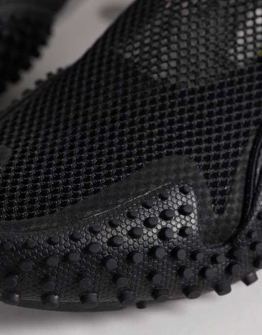 Zapatillas de deporte negras de malla Mostro Flex de PUMA, 4 de 5